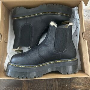 Dr. Marten fur lined platform boots.
